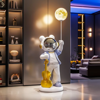 Sculpture d'astronaute ludique avec violon, haut-parleur intégré et lumière lunaire pour salon, chambre à coucher, décoration intérieure, artisanat en résine