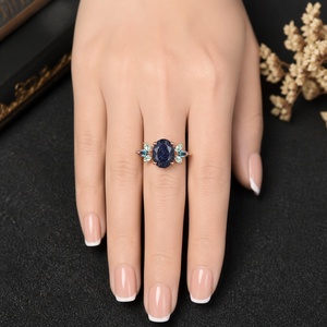Anillo de Plata de Ley 925 Chapado en Oro Rosa con Piedra Arenisca Azul, Corte Ovalado con Detalles de Hojas Marquise, Diseño de Racimo Impresionante - Product Image 3