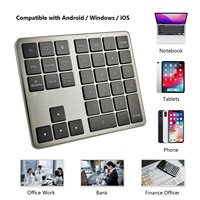   Keyboard Numerik Nirkabel Isi Ulang Tiga Mode Desain Ramping dan Senyap 35-Tombol Numpad USB Eksternal
