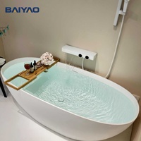Baignoire autoportante ovale en pierre artificielle à surface solide, vente directe usine, idéale pour hôtels et villas