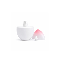 Botol Kosong Tekan Bentuk Oval Peach Mini Portabel 30ml 50ml dengan Logo dan Warna Custom dari Bahan PP/HDPE untuk Krim Tabir Surya dan Lotion