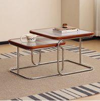 Table basse minimaliste de style Bauhaus-chinois du milieu du siècle, avec structure en acier inoxydable et plateau en verre, pour petits salons, sans assemblage