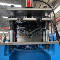 Machine de formage à froid entièrement automatique à grande vitesse pour la fabrication de capuchons de toit en acier coloré