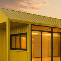 Gelbes Vorgefertigtes Containerhaus 20ft 40ft Einzeleinheit mit Giebeldach Tiny House mit Wintergarten Bezugsfertig