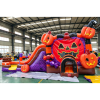 Château gonflable commercial d'extérieur sur le thème de la citrouille d'Halloween avec toboggan intégré pour la location