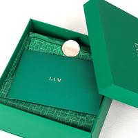 Sérum de luxe soins de la peau cosmétiques mystère boîte-cadeau de base supérieure boîte d'emballage en papier vert brillant à lèvres avec papier de soie