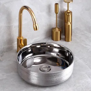 Lavabo de salle de bain en céramique dorée nouveau modèle de lavabo nouveau modèle de lavabo