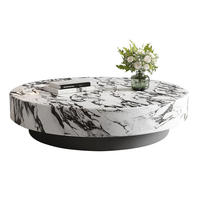 Table basse ronde minimaliste en marbre avec structure en métal pour hôtel et maison