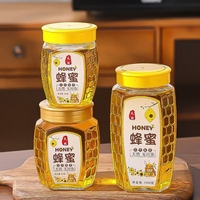 Fabrik-Großhandel Neues Sechseckiges Honigglas mit Bienenstock-Muster, 380ml/500ml/730ml, mit Deckel