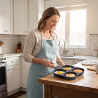 Prix de gros Poêle à frire en bakélite 4 trous en aluminium moulé sous pression antiadhésif avec manche pour la cuisson à quantité minimale de commande basse