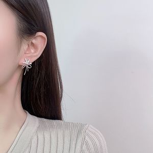 Pendientes de circonita con diseño de lazo de cinta y nieve, engaste de bisel, regalo de moda para mujer, Yiwu - Product Image 2