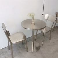 Ensemble table et chaises de restaurant BILIDO, base en acier inoxydable moderne, pour usage hôtelier