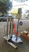 Pompe à vis pneumatique pour le transfert de concentrés et purées de fruits épais, avec plaque de pression de levage
