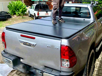 Couverture de benne rigide pliable en trois parties en alliage d'aluminium 4x4 de haute qualité, étanche, pièces et accessoires pour pick-up Hilux 2024
