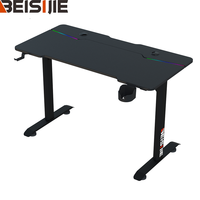 Bureau de jeu Wquantum réglable en hauteur avec LED RGB, surface en MDF mélaminé, porte-gobelet, design en Z, crochet pour casque, pour bureau à domicile et PC