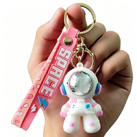 Porte-clés pas cher de dessin animé astronaute, figurine de spationaute, pendentif pour sac et voiture, jouet de machine à breloques pour couple