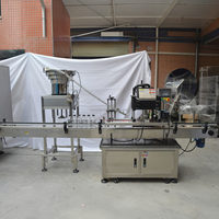 Machine automatique de bouchage de bouteilles en verre pour la production de flacons compte-gouttes à fine brume, de parfums, d'huiles essentielles et de cosmétiques