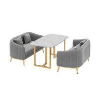 Ensemble de chaises et de table de salle à manger de luxe moderne haut de gamme personnalisé avec structure en métal pour usage commercial