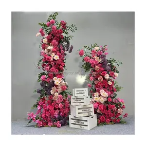 ピンクのアーチの花の結婚式の背景の装飾ブライダルシャワーイベントの装飾のための花のアーチ道の花のアーチ