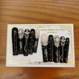 <span class=keywords><strong>Faux</strong></span> <span class=keywords><strong>ongles</strong></span> noirs gothiques de designer américain <span class=keywords><strong>Faux</strong></span> <span class=keywords><strong>ongles</strong></span> de haute qualité en gel extra long et souple faits à la main en acrylique de luxe à presser 10 pièces - Product Image 1