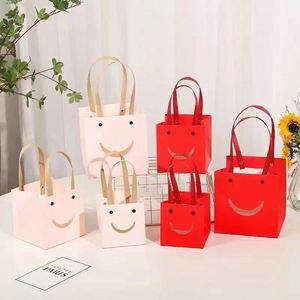 Nouveauté 2023 : Sac à fleurs portable avec visage souriant, 3 tailles, sac floral pliable carré en papier kraft pour boutique de cadeaux - Product Image 5