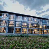 Maison modulaire de luxe préfabriquée à deux étages en béton avec mobilier Solution clé en main pour les propriétaires d'appartements