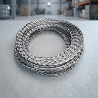 Fil barbelé concertina en acier galvanisé pour barrière de sécurité, bobine de construction industrielle et résidentielle