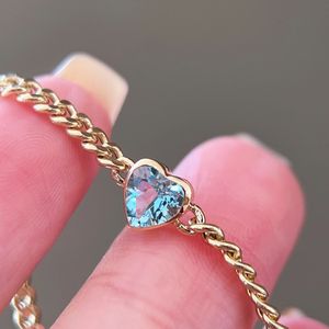 Bracelet en or véritable 18 carats avec cœur en aquamarine et maillons cubains de Xinfly Fashion Jewelry - Product Image 1