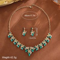 Ensemble d'accessoires deux pièces pour robe de mariée et de soirée : collier et boucles d'oreilles en alliage, élégante chaîne de clavicule pour femme