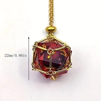 D20 Quicksand Dice avec pendentifs de style cage en acier inoxydable remplaçables, adaptés au port et utilisables à des fins de jeu.