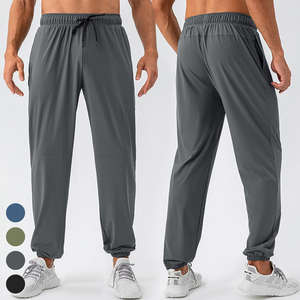 Pantalon de jogging uni fin pour homme avec cordon de serrage, coupe ample et poches latérales, idéal pour le fitness et la course à pied - Product Image 6