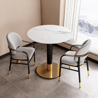 Table à manger ronde contemporaine en marbre avec base noire et dorée pour restaurant, hôtel, café, bistrot, appartement, cuisine