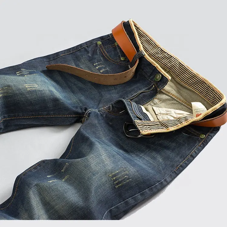 Pantaloni jeans denim da uomo strappati lavati strappati con logo personalizzato all'ingrosso dello stilista di moda