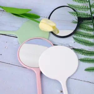 Vente en gros Design personnalisé Miroir à main portable Miroir coeur rose Miroir cosmétique de poche quatre couleurs