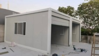 Maison conteneur moderne modulaire respirante en structure acier pour abri de voiture, garage ou remise