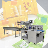 Machine d'emballage industrielle automatique SZ-750W pour sachets coussin, 25-60 sachets/min, pour produits surgelés en usine, avec plateau, pour l'emballage de rouleaux de printemps