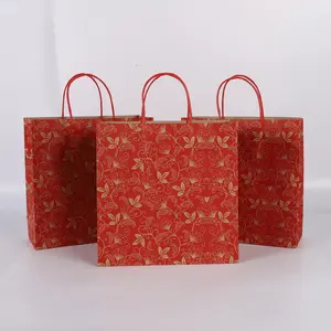 Sacchetti di carta Kraft di lusso stampati personalizzati Eco Friendly marca famosa borsa di carta da Shopping regalo con il tuo Logo