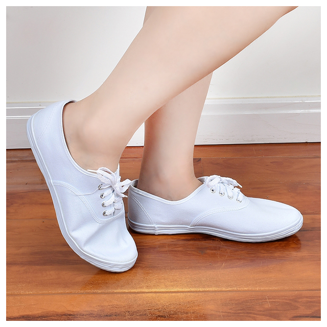 Hot-sale Unisex Wholesale White Casual Shoes Men Breathable Lace-up Canvas Shoes Vulcanized Walking Style Shoes for Ladies