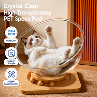Lit pour chat en acrylique haute transparence OEM/ODM, capsule spatiale avec base rotative en bois et billes de circulation, nid d'intérieur pour animaux de compagnie