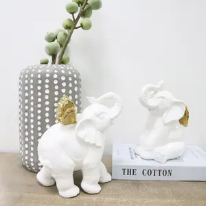 الجملة منضدة المكتب المنزلي ديكور السيراميك الأبيض الفيل تمثال للبيع