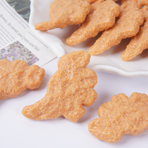 Modelo simulado de nugget de pollo con forma de dinosaurio, bolsa divertida, llavero, colgante, juguete de PVC simulando nugget de pollo frito. - Product Image 3
