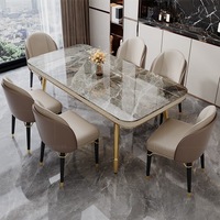 Table à manger et chaise de roche taille appartement lumière luxe moderne simple table à manger rectangulaire en marbre en acier inoxydable