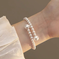 Bracelet en perles de verre, design de niche, accessoire de mode de luxe léger, élégant, extensible, réglable, fausses perles pour femme