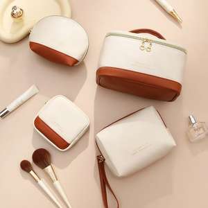 Organizador <span class=keywords><strong>de</strong></span> aseo <span class=keywords><strong>de</strong></span> viaje para mujer <span class=keywords><strong>de</strong></span> gran capacidad al por mayor, logotipo personalizado, cremallera reutilizable, letras <span class=keywords><strong>de</strong></span> PU impermeables a la moda - Product Image 1