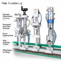 Machine de remplissage et de capsulage de diffuseurs Yide YD-21 avec pressage de bouchons internes, écran tactile PLC et alimentation vibratoire des bouchons