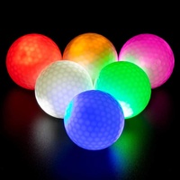 Balle de golf lumineuse LED colorée en caoutchouc souple Surlyn avec logo imprimé pour l'entraînement nocturne