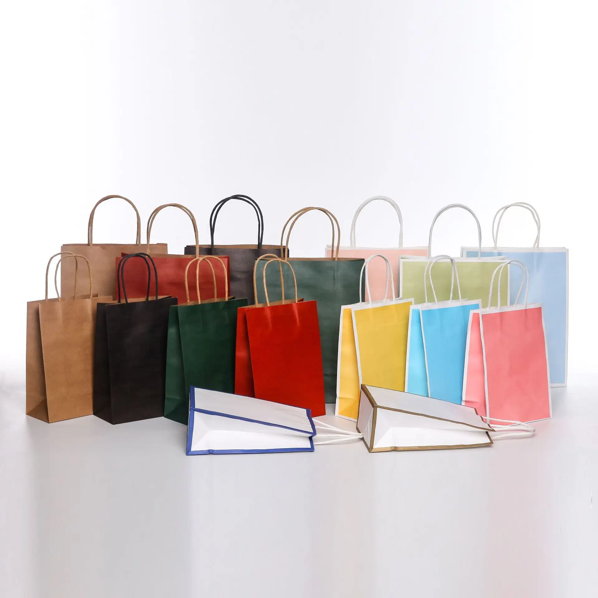 Bolsas de papel Kraft coloridas con asas para compras de regalos Bolsas de regalo de papel para alimentos dulces