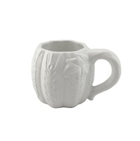 Tasse à café en céramique blanche avec motif citrouille