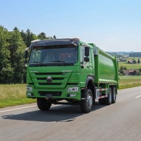 Camion compacteur à chargement arrière Sinotruk Howo 20 m³ 6x4, diesel manuel, pour déchets compressés verts et collecte de déchets municipaux