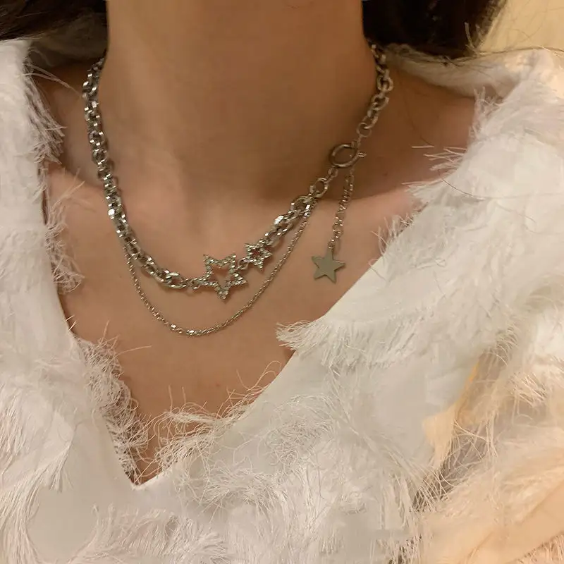 Koreanische Mode Silber-Stern doppelschichtige Zahnstange-Halsband Weiblich Hip-Hop Kurzarm Knochenkette Choker-Halsband für Damen